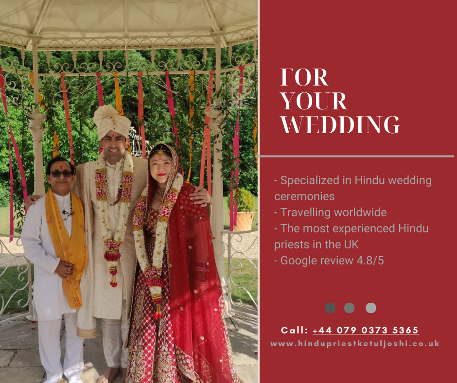 Hindu priest for wedding ceremony guiding bride and groom during pheras in a UK wedding