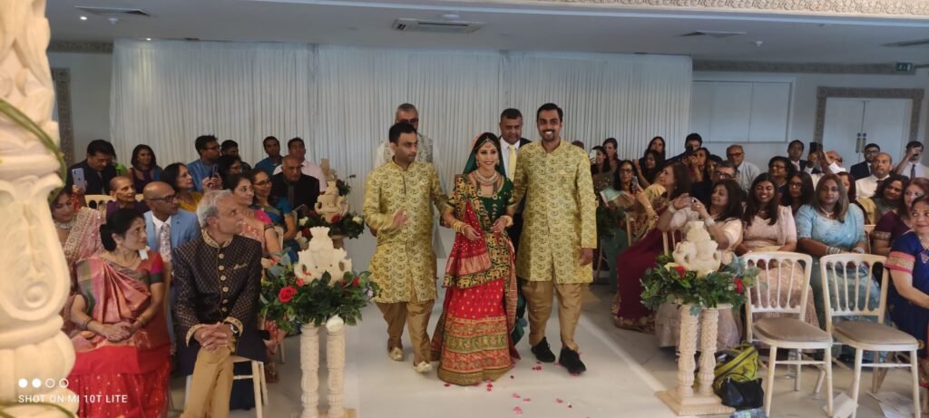 Bride and groom taking seven vows during Hindu wedding ceremony with Indian wedding priest