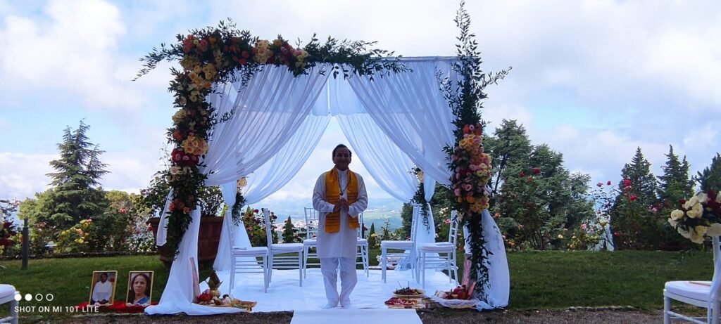 Bride and groom taking seven vows during Hindu wedding ceremony with Indian wedding priest