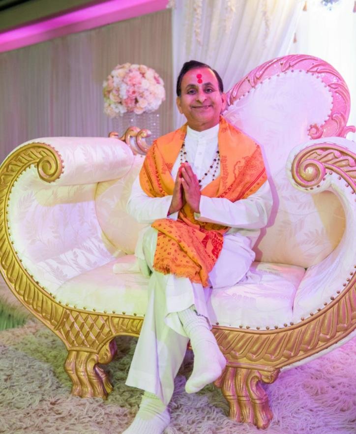Hindu priest conducting traditional Hindu funeral ceremony in the UK